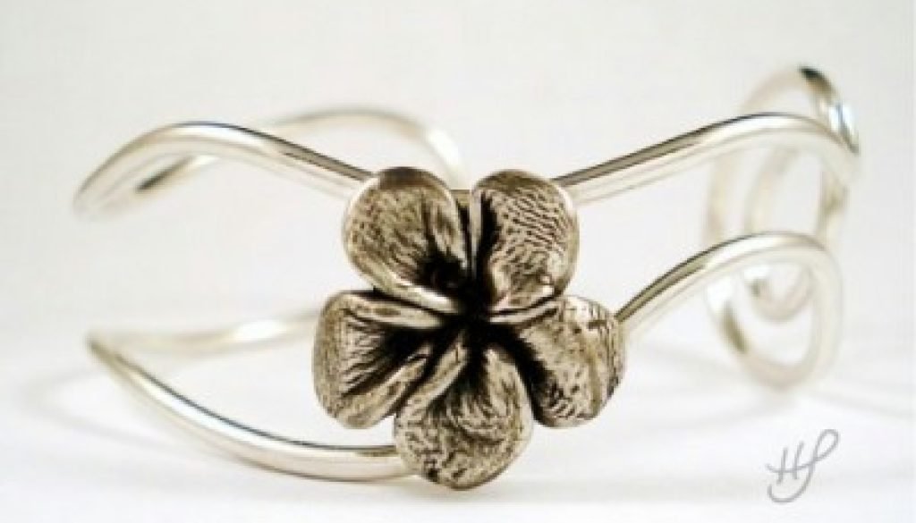 Silver Cuff Bracelet with a Plumeria Flower Detail