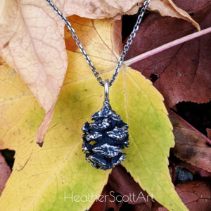 Redwood Pine Cone Necklace on Fall Leaves